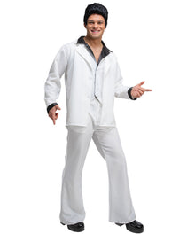 A man modeling a white Elvis-style costume jacket and matching flared pants with black trim, a black wig, and black shoes against a plain white background.