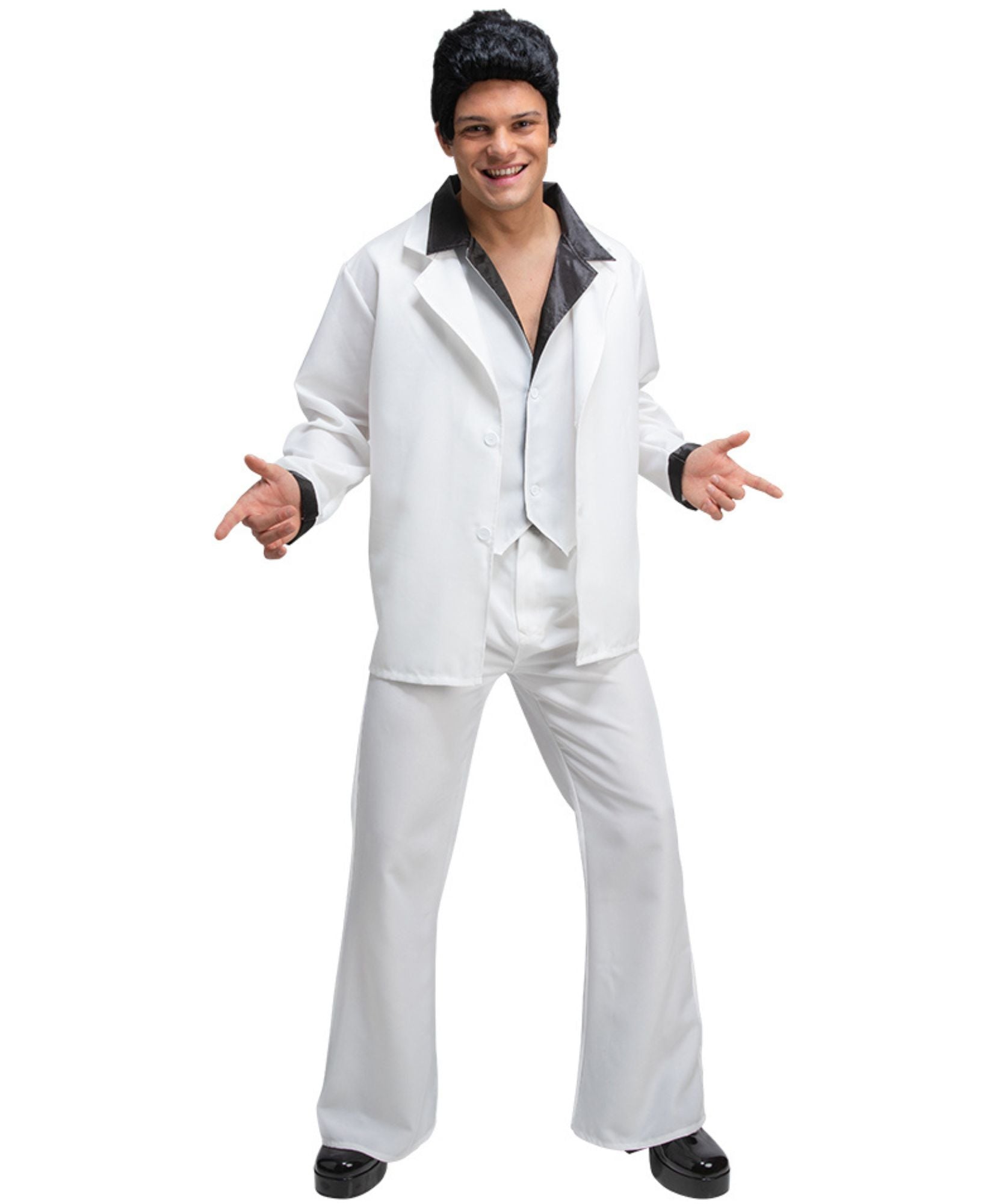 A man modeling a white Elvis-style costume jacket and matching pants with a black shirt underneath, black shoes, and a black hairpiece against a plain white background.