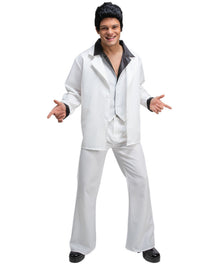 A man modeling a white Elvis-style costume jacket and matching pants with a black shirt underneath, black shoes, and a black hairpiece against a plain white background.