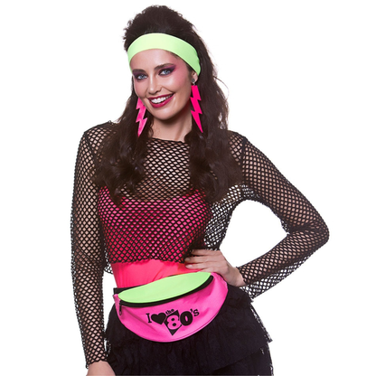 A woman modeling a 1980s retro costume outfit featuring a black fishnet long-sleeve top, a hot pink and lime green fanny pack, a lime green headband, and pink lightning-ear earrings, set against a plain white background.