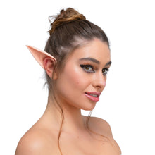 Woman wearing elf ears on a white background