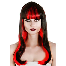 Woman with black and red vampire style wig on a white background