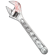 A silver wrench with engraved text on the handle and red paint splatters on the head, shown on a plain white background.