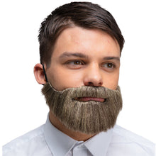 A man wearing a realistic fake beard mask, shown from the chest up against a plain white background.