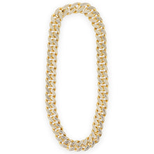 Gold chain necklace on a white background