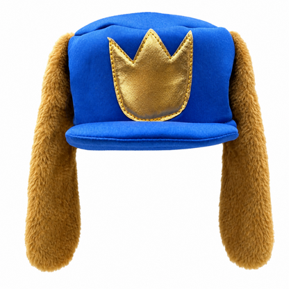A blue hat with long brown ear flaps and a metallic gold crown emblem on the front, shown against a plain white background.