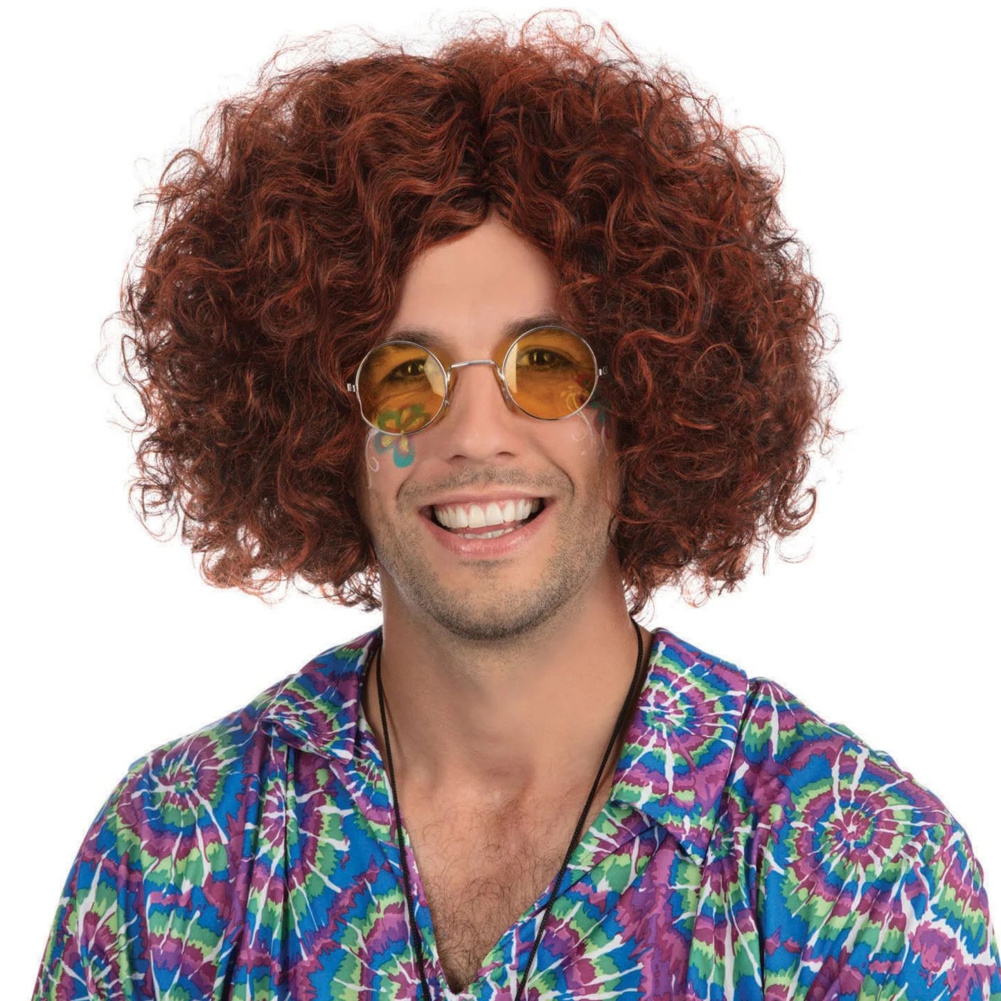 A man wearing a voluminous, curly brown wig, round gold-tinted sunglasses, and a colourful tie-dye button-up shirt against a plain white background.