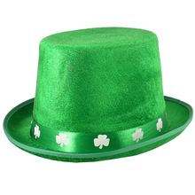 A bright green velvet top hat with a matching green band decorated with white shamrock cutouts, shown on a plain white background.
