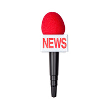 Microphone with a red foam cover and 'NEWS' sign on a white background