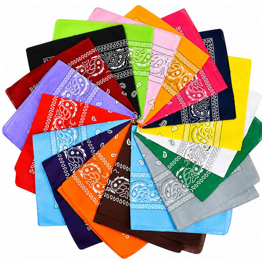 A collection of colorful bandana scarves arranged in a circular fan pattern on a white background, showcasing a wide variety of colors and traditional paisley designs.