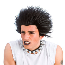 Person wearing a black spiked wig and choker on a white background