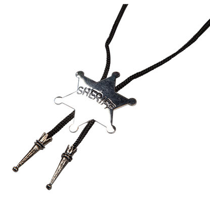 A silver sheriff's badge bolo tie necklace with a black braided cord and silver-toned conical ties, shown on a plain white background.