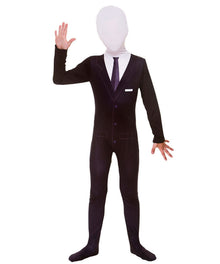 A child wearing a black full-body suit with long sleeves, a white shirt, a dark tie, and a white face mask, standing against a plain white background.