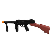 Toy machine gun with black and red design on a white background