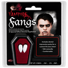 Vampire Fangs costume accessory in retail blister packaging, showing two white fang-shaped dental appliances in a red coffin-shaped holder and included dental impression putty on a black card insert.