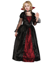 A child wearing a vampire costume dress with a black satin gown, red inner lining, sheer black lace sleeves, a black collar with red trim, and a red-and-black spiderweb patterned front panel, photographed against a plain white background.