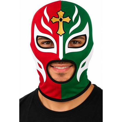 A man wearing a split red and green lucha libre wrestling mask with white flame-like patterns and a gold cross on the forehead, shown against a plain white background.