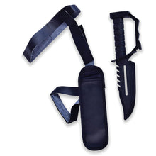 A black plastic and faux leather replica combat knife with a matching black nylon sheath and shoulder strap, displayed on a clean white background.