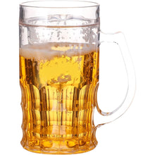 A clear glass beer mug with a ribbed textured body and a curved handle, filled with golden beer and foam, isolated on a white background.