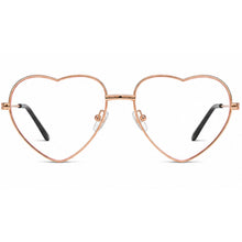 Heart-shaped metal eyeglass frames in a rose gold finish with clear lenses and black temple tips, shown against a plain white background.