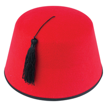 A bright red fez hat with a black tassel and black trim, photographed on a plain white background.