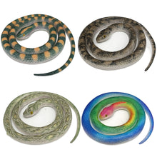 Four coiled snake figurines or toys arranged in a 2x2 grid on a plain white background. The top-left snake is green and orange-brown; the top-right is gray and brown; the bottom-left is pale green and beige; the bottom-right has a blue, green, and pink iridescent-style finish.