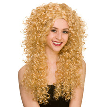 A woman modeling a long, voluminous blonde wig with tight, curly curls against a plain white background.