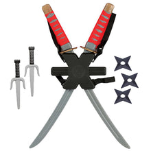 A toy katana-style toy set displayed on a white background, featuring two crossed gray blades with red wrapped handles, a black cross-shaped hilt, three throwing stars, and two silver practice swords.