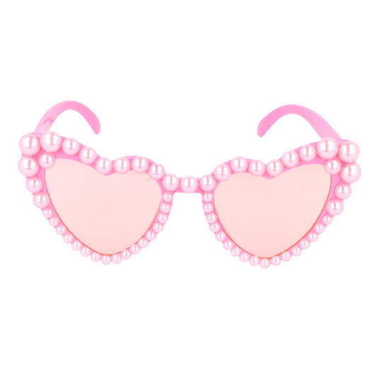 Pink heart-shaped sunglasses with pearl detailing on a white background