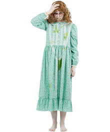 A model wearing a zombie-style costume dress in a mint green and white floral print with fake blood splatters, standing against a plain white background.