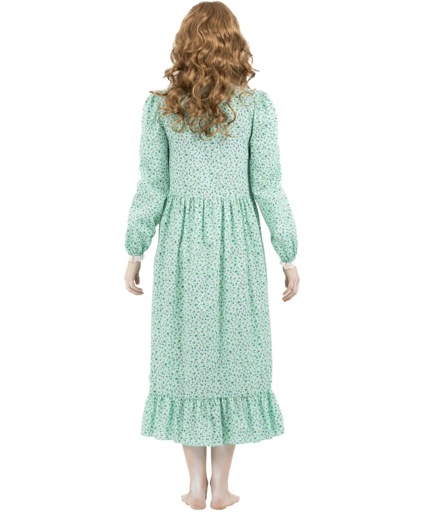 A woman shown from the back wearing a long-sleeve midi dress with a green and white floral pattern, set against a plain white background.