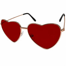 Oversized heart shaped sunglasses with a rose gold metal frame, vibrant red lenses, and black temple tips, shown in profile against a white background. facing forward at an angle