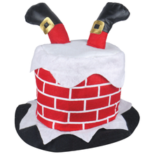 A novelty Christmas hat shaped like a chimney, featuring red felt brick pattern, white faux snow trim, black felt brim and boot legs, and small gold buckle details on a plain white background.