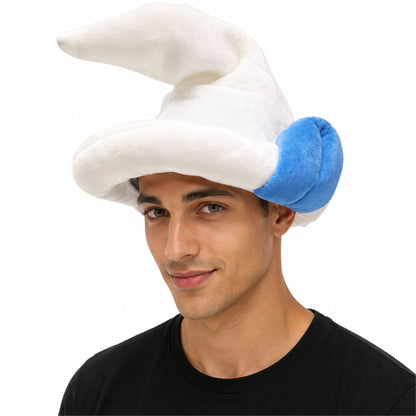 A man wearing a plush, floppy white hat with a bright blue side accent, photographed against a plain white background.