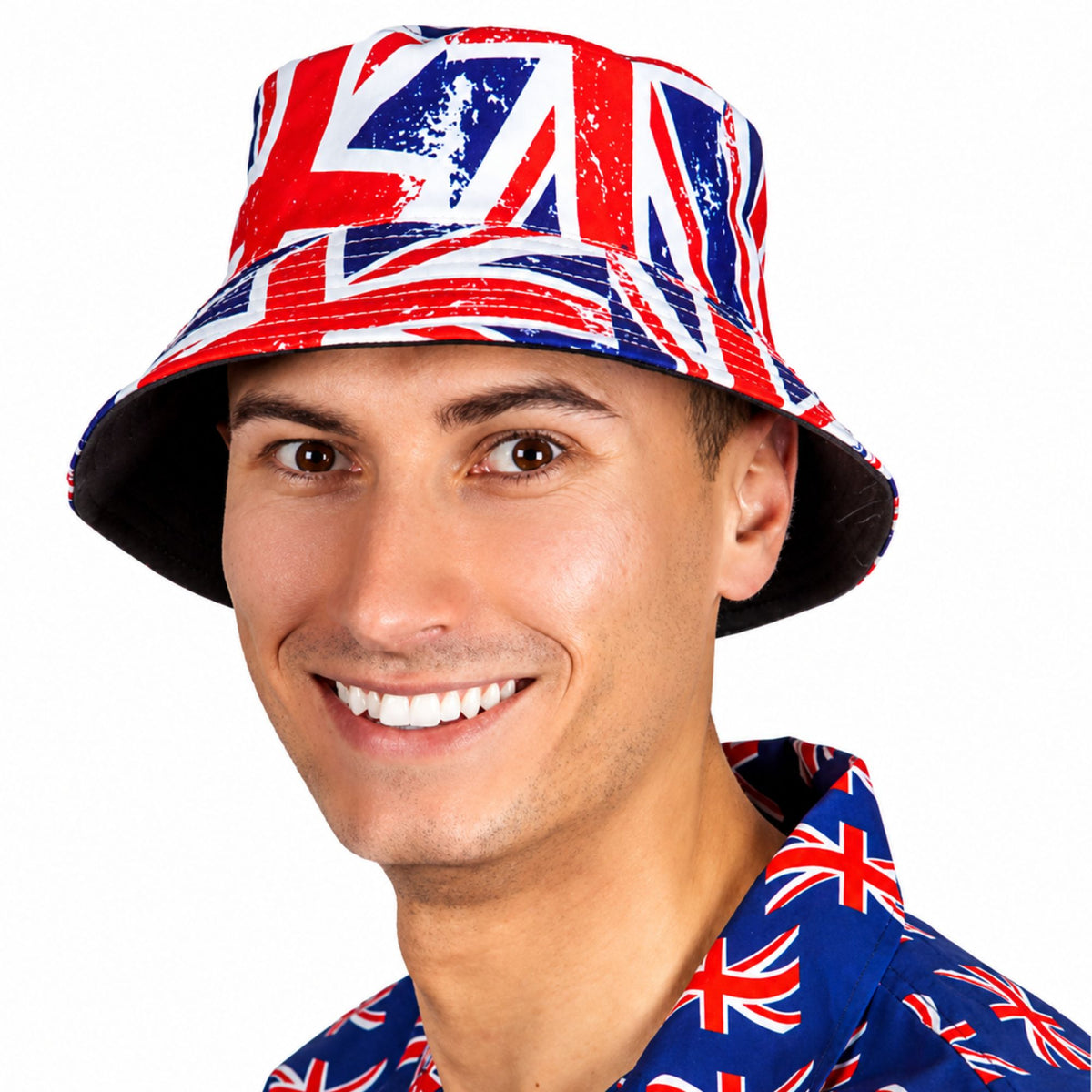 A man wearing a red, white, and blue Union Jack patterned bucket hat and matching patterned shirt, shown against a plain white background.