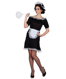 A woman modeling a black and white maid costume with lace trim, a matching headpiece, fishnet tights, and black heels, holding a white feather duster against a plain white background.